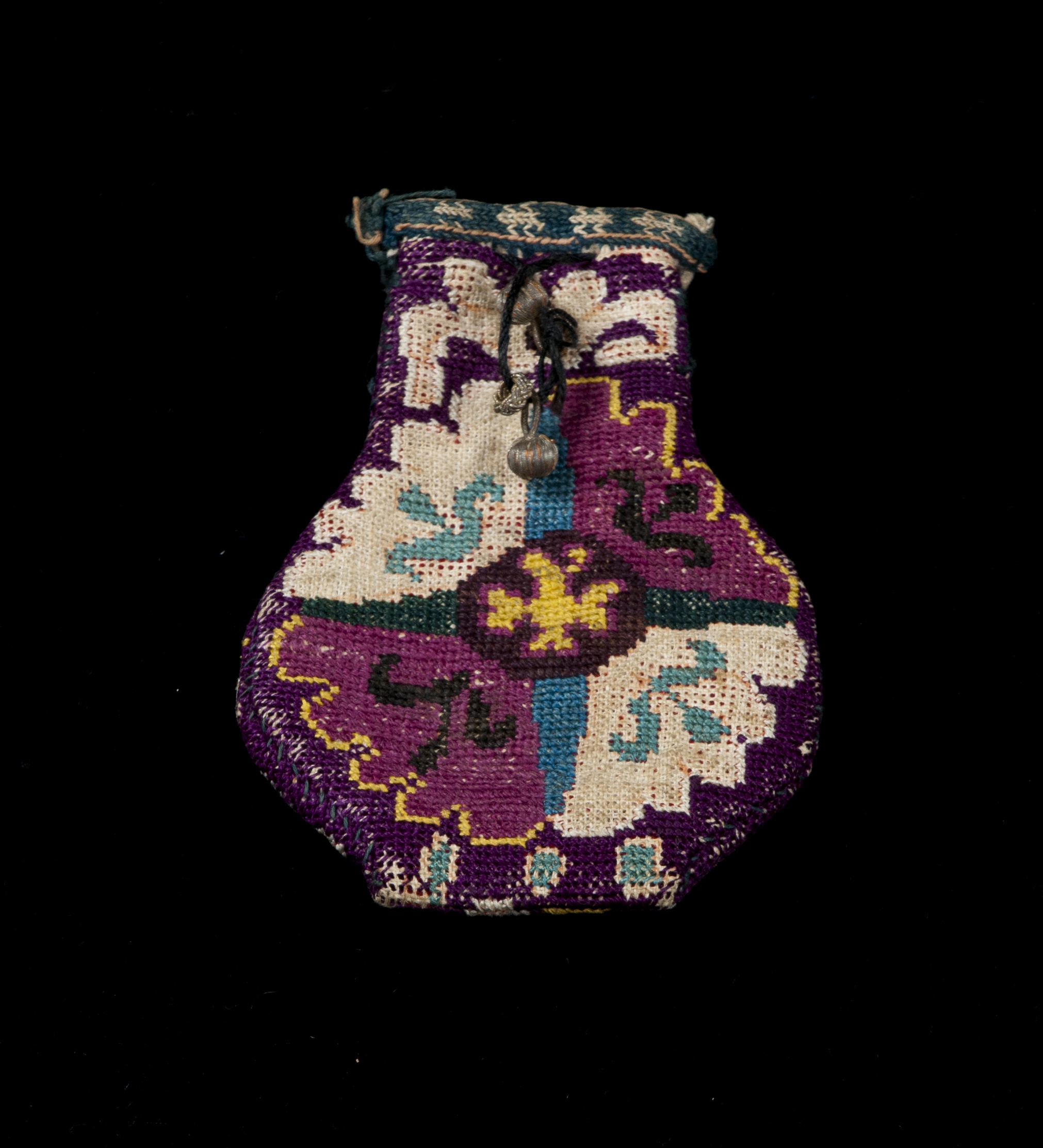 A Lakai embroidered gold/opium pouch